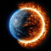 صورة للكرة الأرضية من الفضاء نصفها يحترق. 